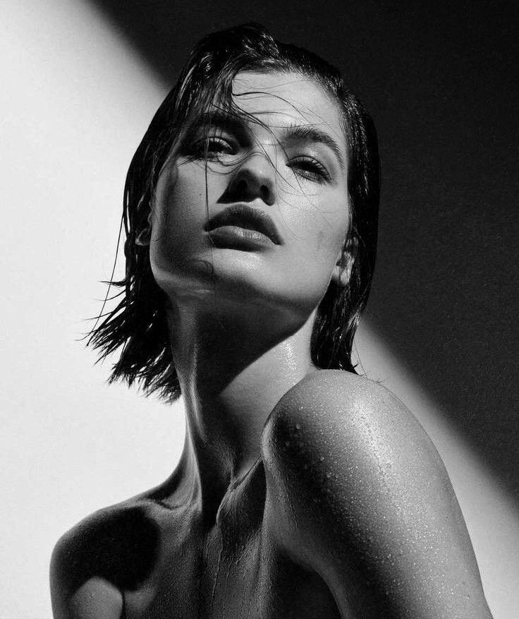 Woman with smooth, glowing skin, representing healthy skin and natural beauty.
